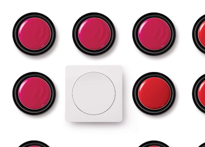 Pattern of red emergency stop buttons around central white push button